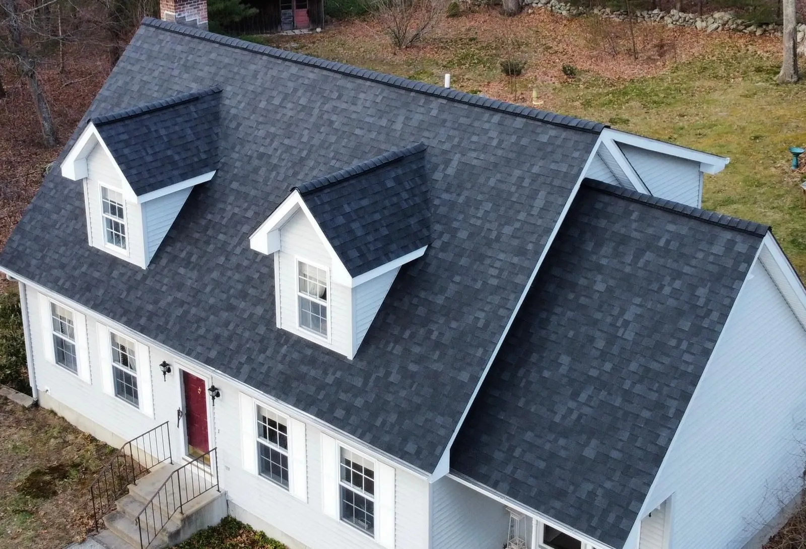 Overhead view of a Conneticut home with a new shingle roof installed by Hammerhead Roofing