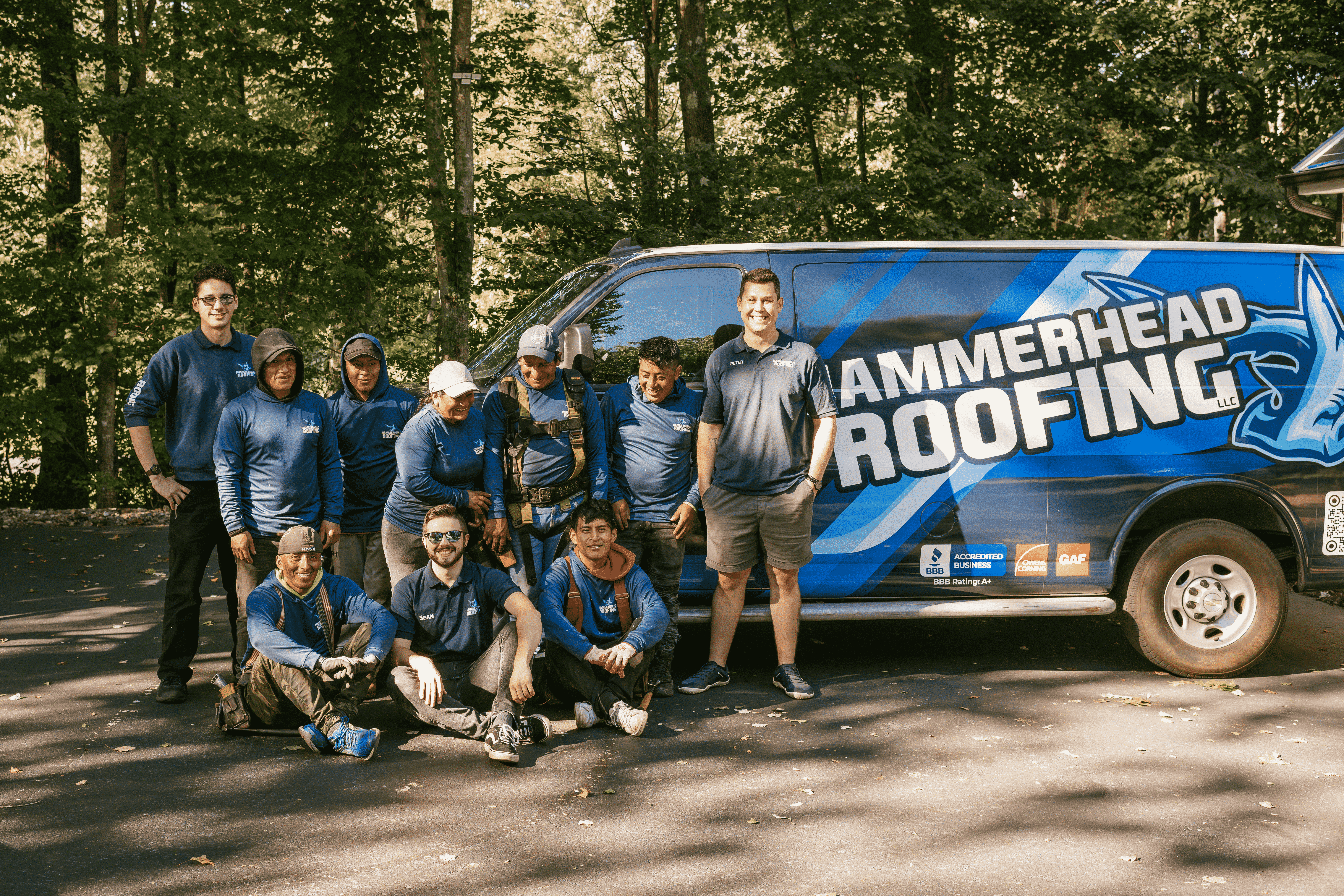 team in front of truck